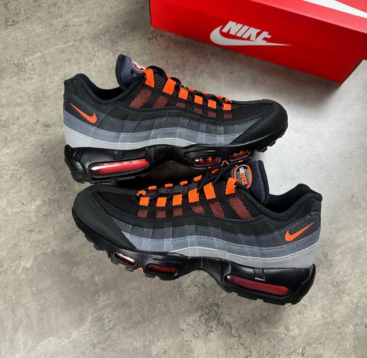 orange and black trainers