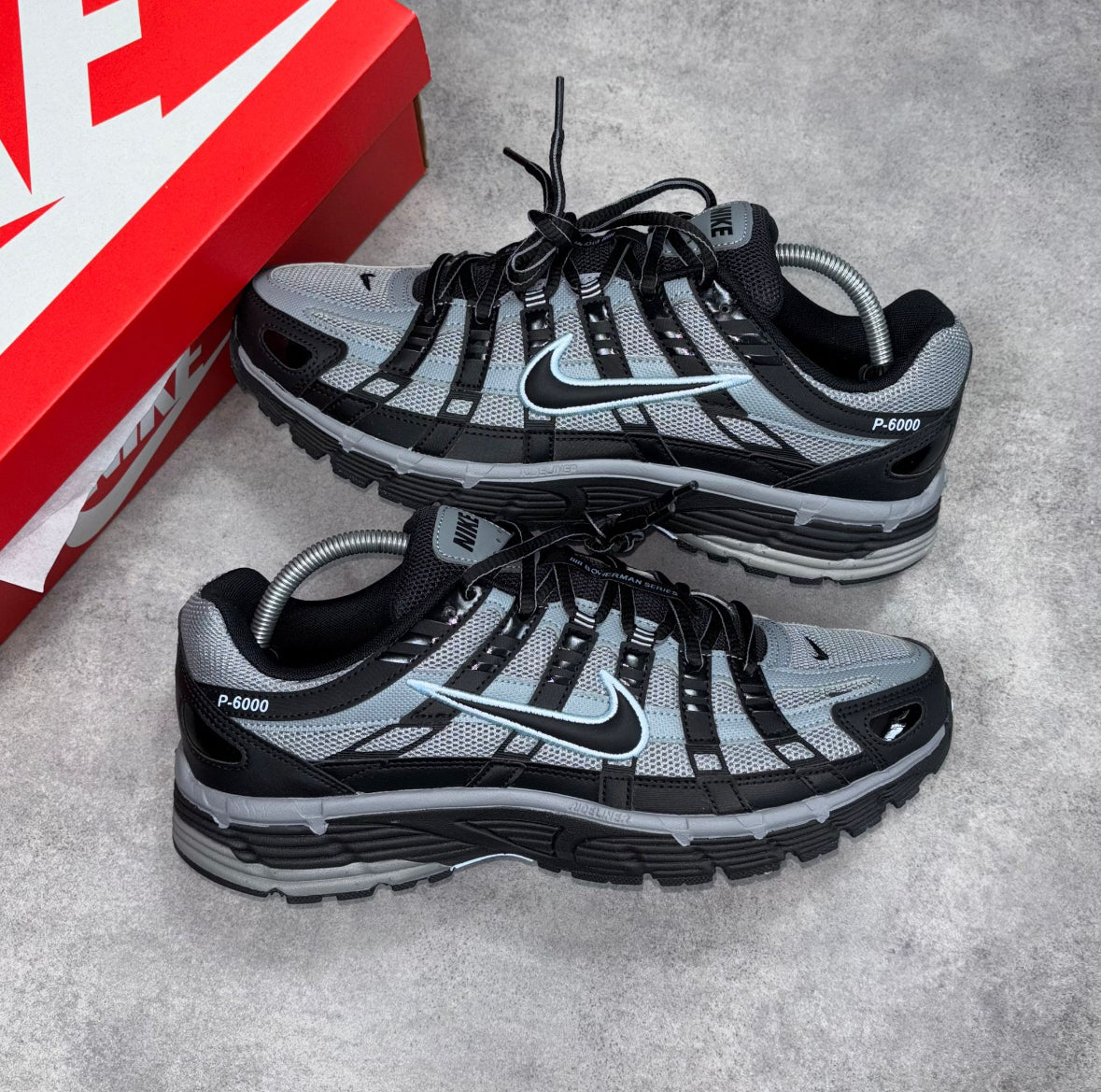 black blue and grey trainers